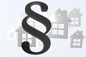 Statute symbol in foreground with houses in the background